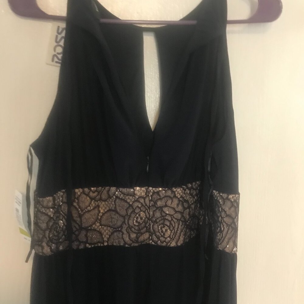 Size 14 Navy Blue Prom Dress new with Tags on it